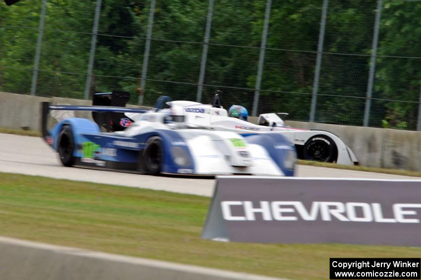 Michal Chlumecky's Panoz Élan DP-02 tags the outside wall at turn 2.