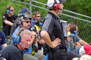 Spotters in the grandstands at turn 1.