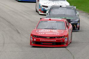 Ross Chastain's Chevy Camaro, David Starr's Toyota Camry and Kevin O'Connell's Chevy Camaro