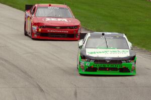 Dakoda Armstrong's Ford Mustang and Lawson Aschenbach's Chevy Camaro