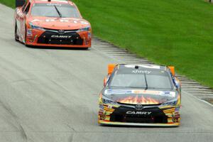 Kenny Habul's Toyota Camry and Daniel Suárez's Toyota Camry