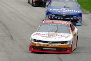 Andy Lally's Chevy Camaro and Elliott Sadler's Ford Mustang