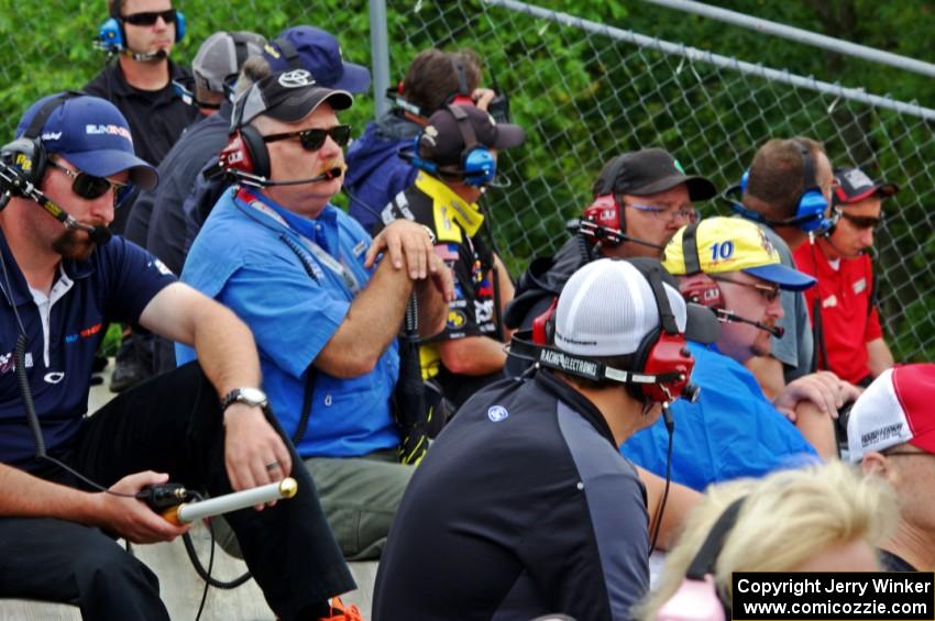 Spotters in the grandstands at turn 1.