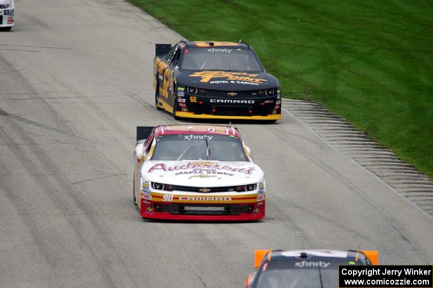 Andy Lally's Chevy Camaro and Brendan Gaughan's Chevy Camaro