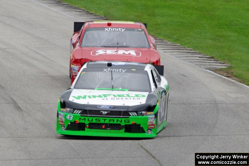 Dakoda Armstrong's Ford Mustang and Lawson Aschenbach's Chevy Camaro