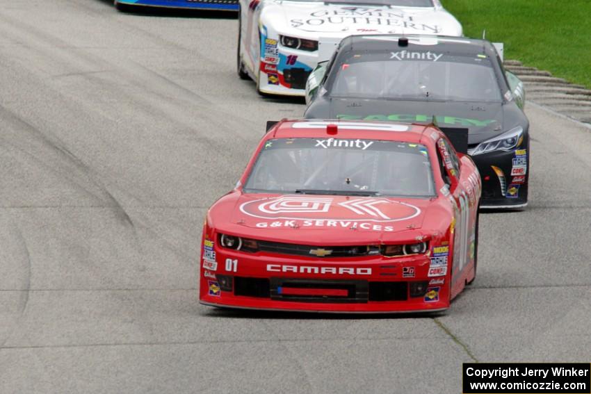 Ross Chastain's Chevy Camaro, David Starr's Toyota Camry and Kevin O'Connell's Chevy Camaro