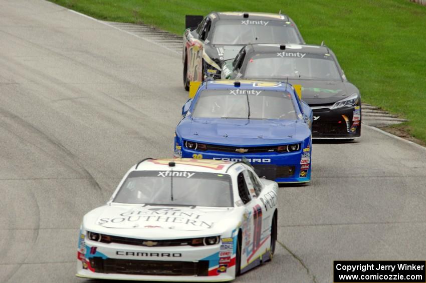 Kevin O'Connell's Chevy Camaro, Ryan Sieg's Chevy Camaro, David Starr's Toyota Camry and Stanton Barrett's Ford Mustang