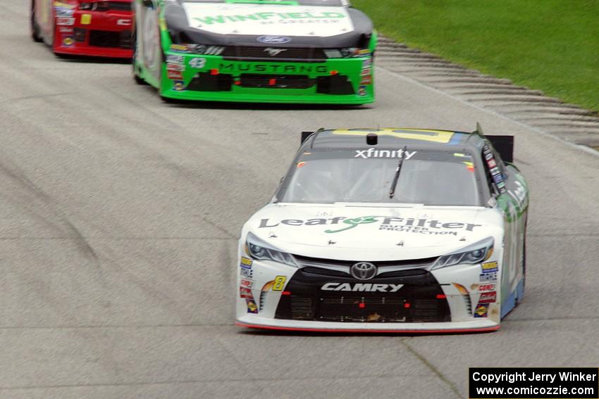 Blake Koch's Toyota Camry and Dakoda Armstrong's Ford Mustang