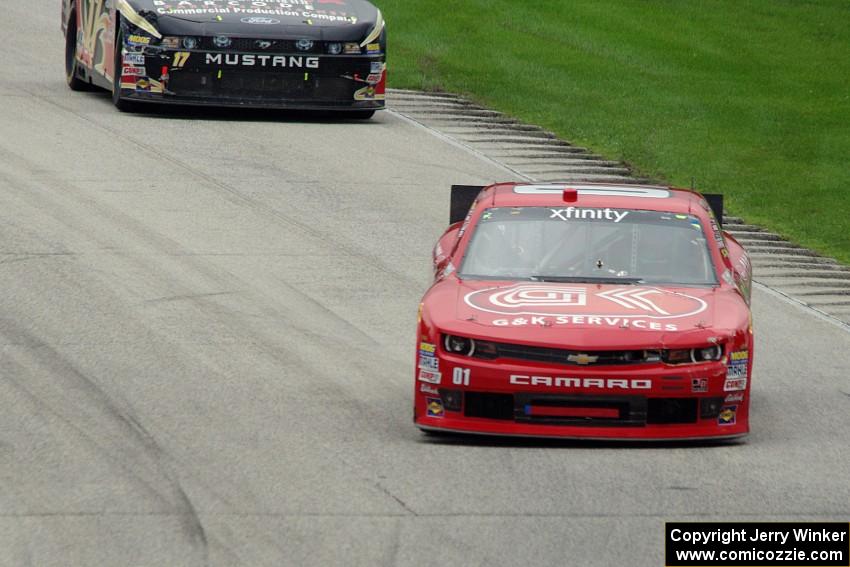 Ross Chastain's Chevy Camaro and Stanton Barrett's Ford Mustang