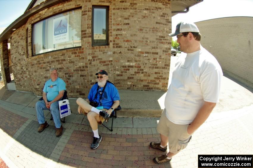 Tim Winker, Clarence Westberg and Ben Wedge take a break in the shade.