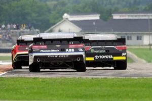 Ryan Reed's Ford Mustang, Boris Said III's Toyota Camry and Ty Dillon's Chevy Camaro