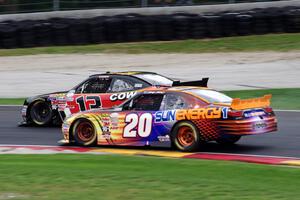 Kenny Habul's Toyota Camry and Tim Cowen's Ford Mustang