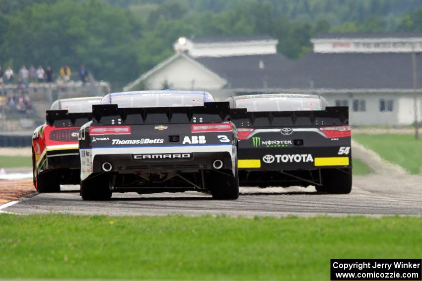 Ryan Reed's Ford Mustang, Boris Said III's Toyota Camry and Ty Dillon's Chevy Camaro