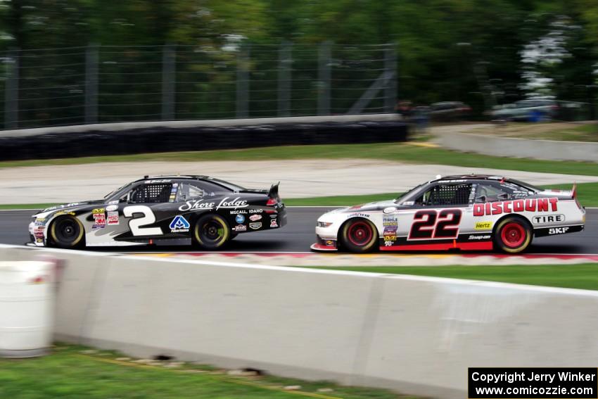 Brian Scott's Chevy Camaro and Ryan Blaney's Ford Mustang