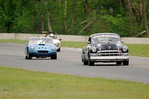 John Daniels, Jr.'s Cadillac Sedanette, John Hagen's TVR Griffith and Steve Nichols' MGB