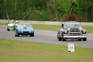 John Daniels, Jr.'s Cadillac Sedanette, John Hagen's TVR Griffith and Steve Nichols' MGB