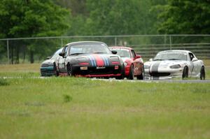 Samantha Silver's, Chris Craft's and Jamey Randall's Spec Miata Mazda Miatas with Mark Utecht's STL Honda Civic