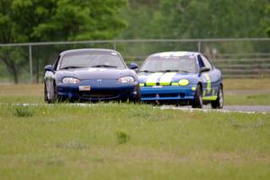 Craig Silver's Spec Miata Mazda Miata and John Glowaski's STL Dodge Neon ACR