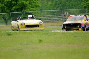 Brooke Fairbanks' H Production Triumph Spitfire and Jimmy Griggs's GTL VW Rabbit