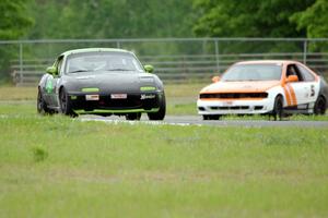 Aaron Jongbloedt's Spec Miata Mazda Miata and James Berlin's STL Nissan 200SX