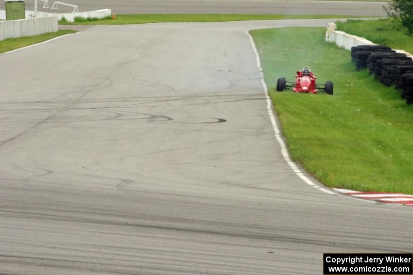 Ethan Mackey's EuroSwift SC94T Formula Ford spins coming out of turn 13.