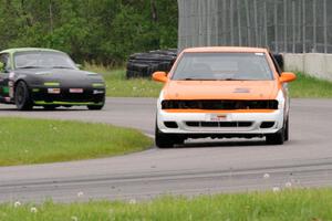 James Berlin's STL Nissan 200SX and Aaron Jongbloedt's Spec Miata Mazda Miata