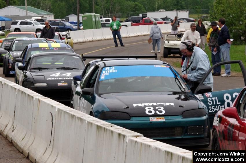 Mark Utecht's STL Honda Civic, Paul Stephan's SPU Volkswagen Corrado SLC and others on the false grid.