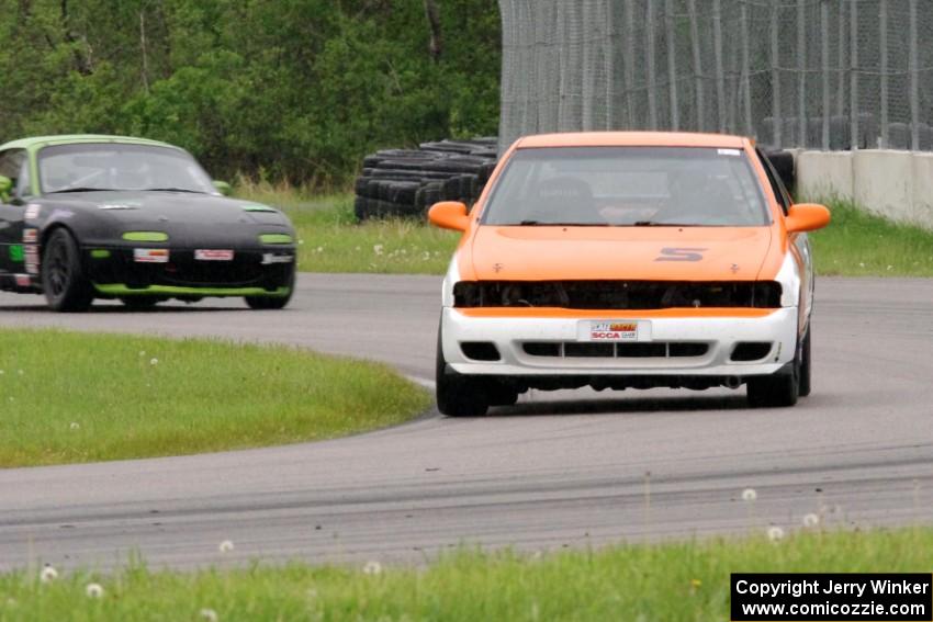 James Berlin's STL Nissan 200SX and Aaron Jongbloedt's Spec Miata Mazda Miata