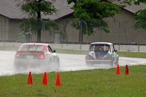 Dyrk Bolger's Austin Mini-Cooper and Ed Dulski's Datsun 240Z