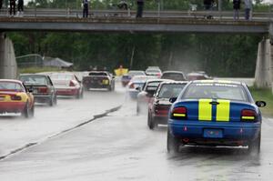 John Glowaski's ITA Dodge Neon ACR starts at the rear of Race Group 4 just before the drop of the green.