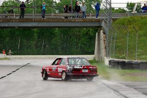 Mike Campbell's ITS BMW 325is gets loose out of turn 12.
