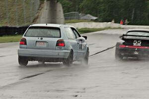 Glen Wilson's ITS VW GTI chases Phil Magney's ITE-1 Porsche 993