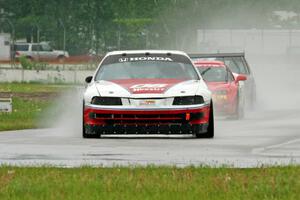 Dan Hedley's E Production Honda Prelude, Darrell Peterson's SPO Chevy Corvette and Austin Hallberg's ITA BMW 328