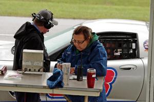 Dale Hammons and Marge Steffan weigh Bill Collins' T2 Chevy Corvette.