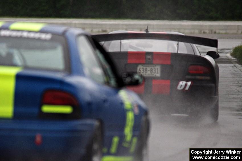 Keith Anderson's GT-1 Dodge Viper leads John Glowaski's ITA Dodge Neon ACR