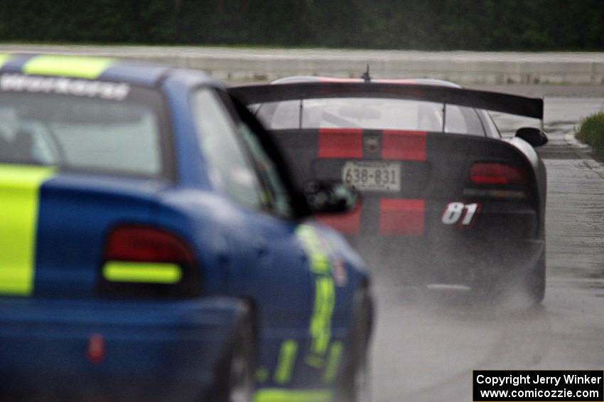 Keith Anderson's GT-1 Dodge Viper leads John Glowaski's ITA Dodge Neon ACR