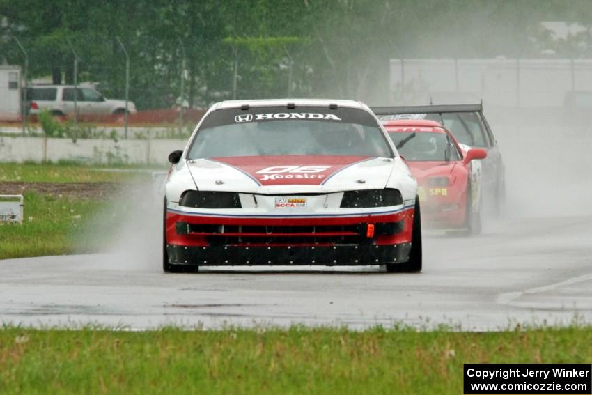 Dan Hedley's E Production Honda Prelude, Darrell Peterson's SPO Chevy Corvette and Austin Hallberg's ITA BMW 328