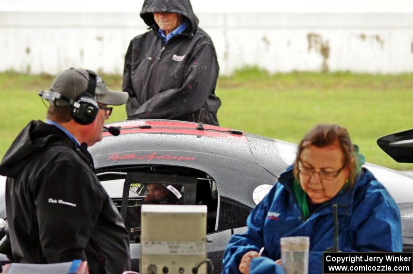 Dale and Julie Hammons along with Marge Steffan weigh Keith Anderson's GT-1 Dodge Viper.