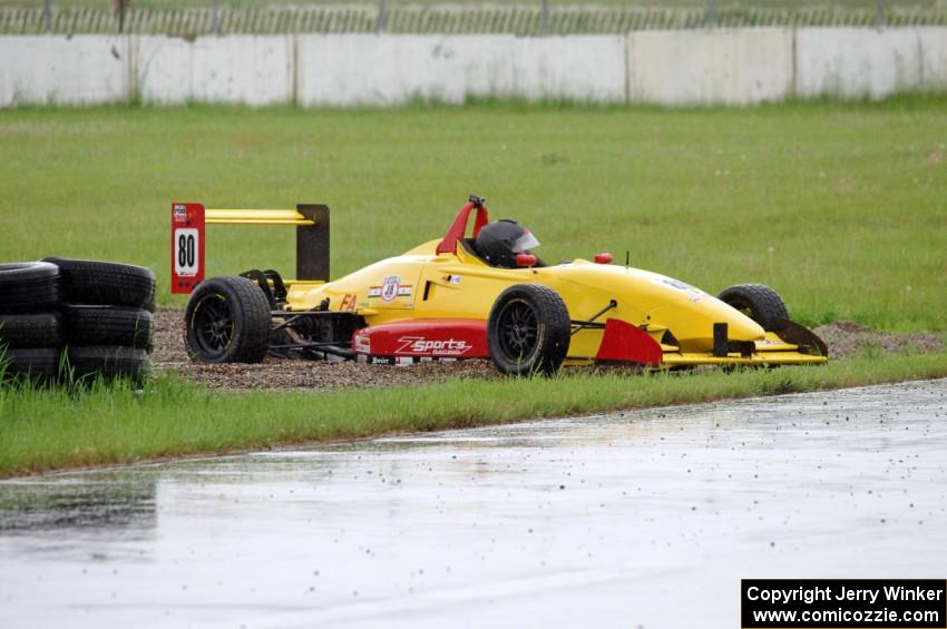 Steve Thomson's Van Diemen RF02/Zetec Formula Atlantic is stuck after going off at turn 12.