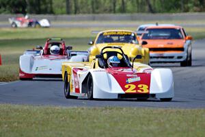 Rich Omdahl's PTB Spec Racer Ford leads the pack into turn 4.