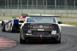 Dave LaFavor's PTB Spec Racer Ford and James Pesek's AIX Ford Mustang