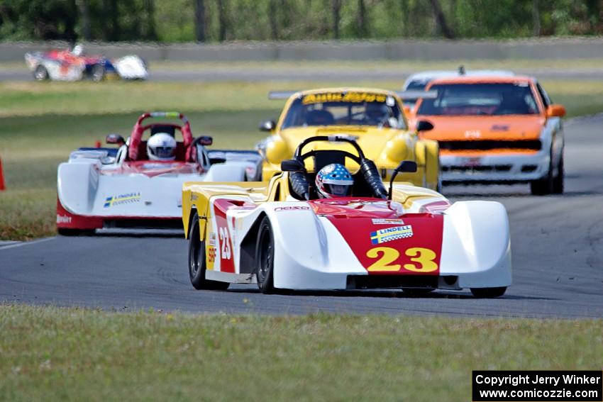 Rich Omdahl's PTB Spec Racer Ford leads the pack into turn 4.