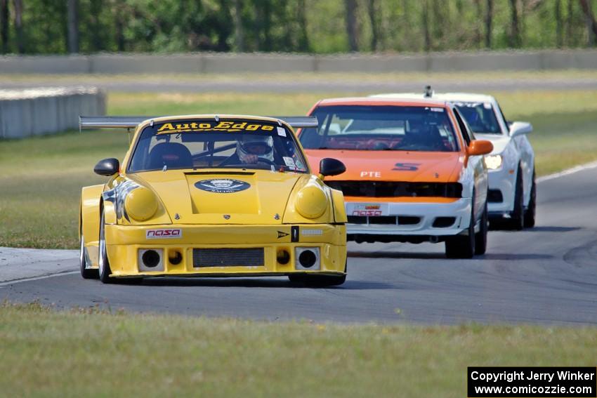 Lance Van Norman's HPDE3 Porsche 911, Patrick Price's PTE Nissan 200SX and Stephen Fuller's HPDE2 Chevy Camaro