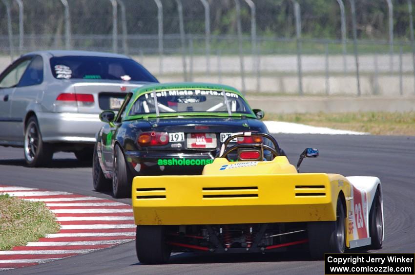 Nicholas Anderson's HPD Honda Civic, Aaron Jongbloedt's PTE Mazda Miata and Rich Omdahl's PTB Spec Racer Ford