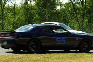 David Gatto's HPDE1 Dodge Challenger ducks to the inside of turn 3 to avoid a stopped car.