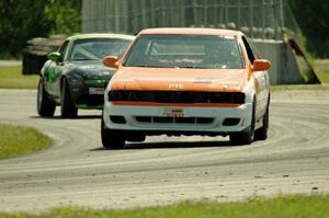 Patrick Price's PTE Nissan 200SX and Aaron Jongbloedt's PTE Mazda Miata