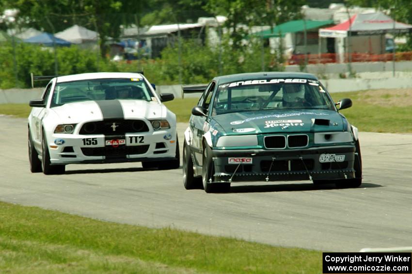 Ben Aurich's TTU BMW 325is and Allen Myers' TT2 Ford Mustang Boss 302S