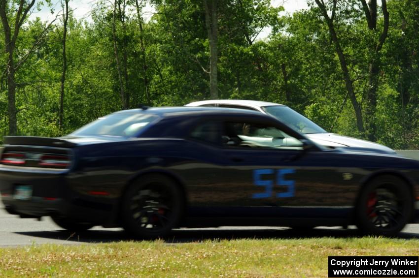 David Gatto's HPDE1 Dodge Challenger ducks to the inside of turn 3 to avoid a stopped car.