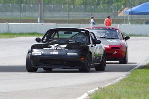 Paul Gilbert's Spec Miata Mazda Miata and Lon Blaser's STL Mazda Miata