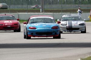 Rick Buan's, Chris Craft's and Andrew Jenkins' Spec Miata Mazda Miatas